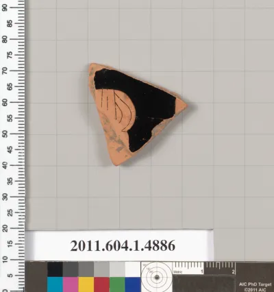 Terracotta fragment of a kylix (drinking cup)