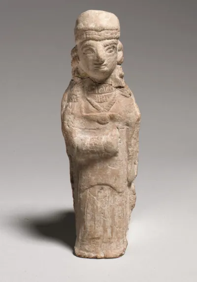 Standing female figurine