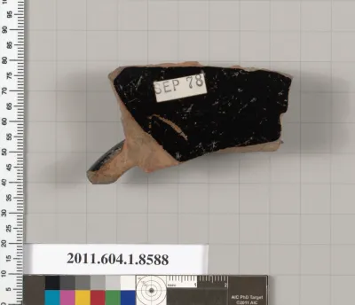 Terracotta fragment of a stemless kylix (drinking cup)