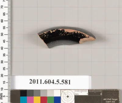 Terracotta fragment of a stemless kylix (drinking cup)?