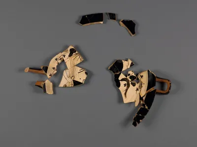 Attic White-Ground Cup (Lipped Inside) Fragment with Dionysos and a Satyr and One Black-Gloss Cup Fragment (rim)