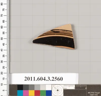 Terracotta fragment of a kylix (drinking cup)