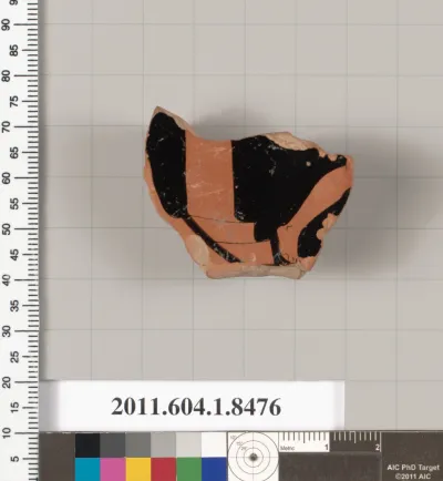 Terracotta fragment of a stemless kylix (drinking cup)