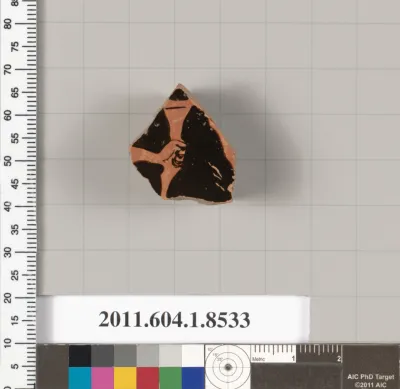 Terracotta fragment of a stemless kylix (drinking cup)