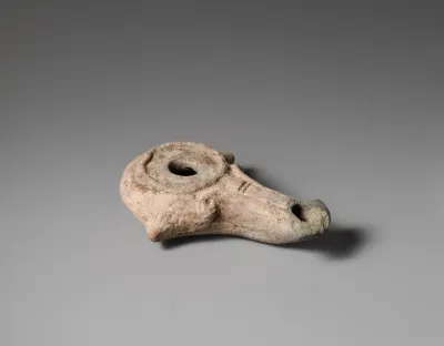 Terracotta oil lamp