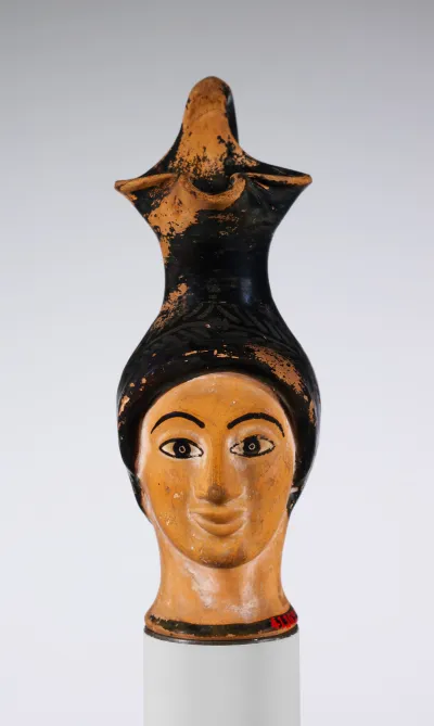Terracotta oinochoe (jug) in the form of a woman's head