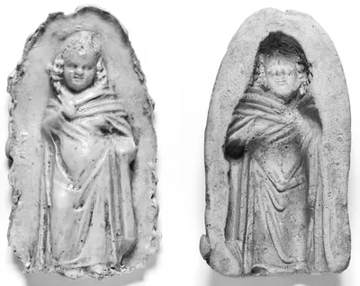 Mold of the Front of a Young, Long-Haired Girl