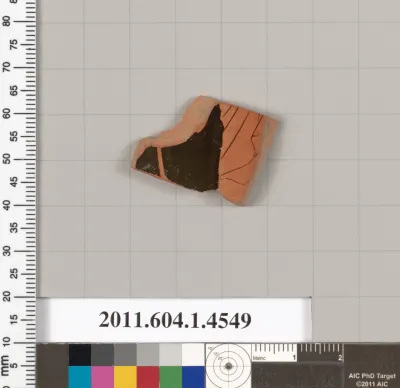 Terracotta fragment of a kylix (drinking cup)