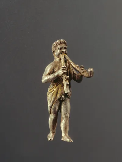 Statuette of a Young Satyr Playing the Double Aulos