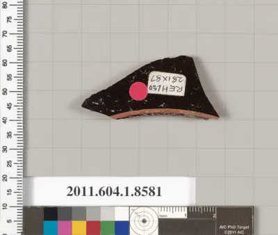 Terracotta fragment of a stemless kylix (drinking cup)