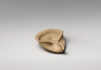 Terracotta saucer-shaped lamp