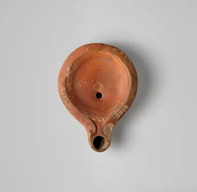 Terracotta oil lamp
