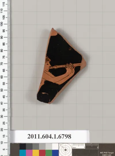Terracotta fragment of a kylix (drinking cup)