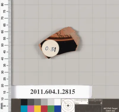 Terracotta fragment of a kylix (drinking cup)