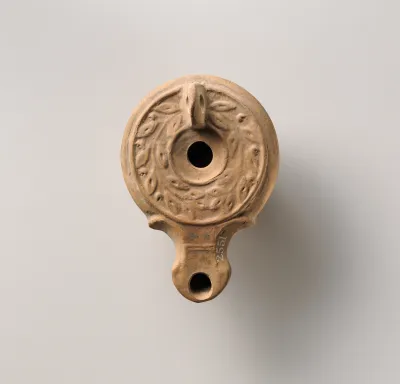 Terracotta oil lamp
