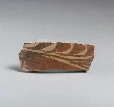 Terracotta vessel fragment with grass motif