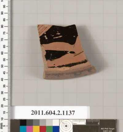 Terracotta fragment of a lekanis lid (covered dish)