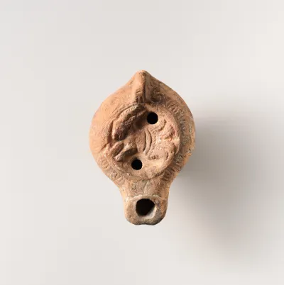 Terracotta oil lamp