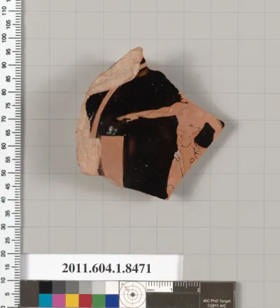 Terracotta fragment of a stemless kylix (drinking cup)