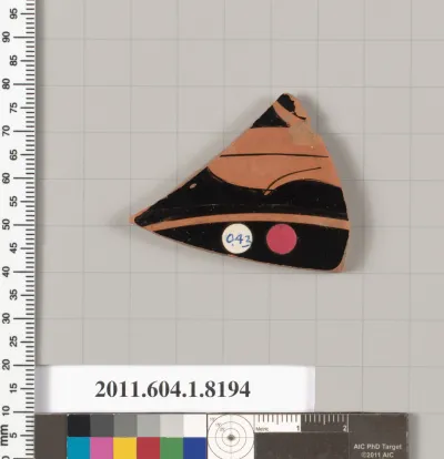 Terracotta fragment of a kylix (drinking cup)