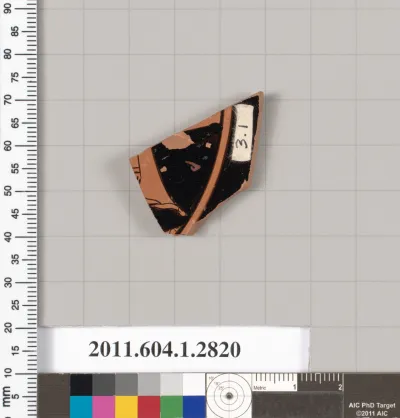 Terracotta fragment of a kylix (drinking cup)