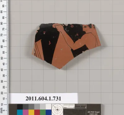 Terracotta fragment of a kylix (drinking cup)