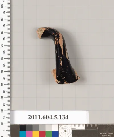 Terracotta fragment of a kylix (drinking cup)