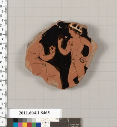Terracotta fragment of a stemless kylix (drinking cup)