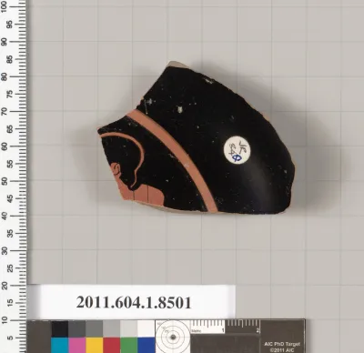 Terracotta fragment of a stemless kylix (drinking cup)