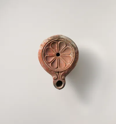 Terracotta oil lamp