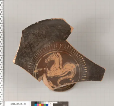 Terracotta fragment of a kylix (drinking cup)