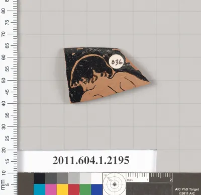 Terracotta rim fragment of a kylix (drinking cup)