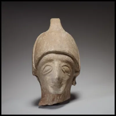 Male head wearing a helmet