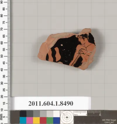 Terracotta fragment of a stemless kylix (drinking cup)