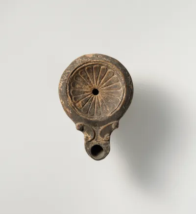 Terracotta oil lamp