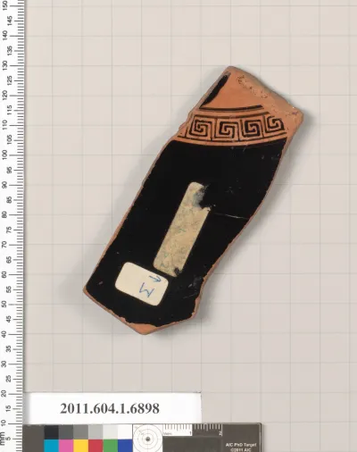 Terracotta fragment of a kylix (drinking cup)