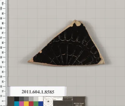 Terracotta fragment of a stemless kylix (drinking cup)