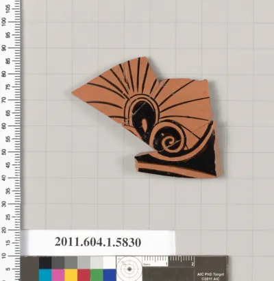 Terracotta fragment of a kylix: eye-cup  (drinking cup)