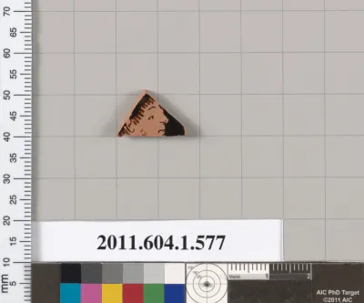 Terracotta fragment of a kylix (drinking cup)