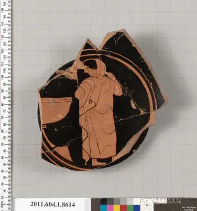 Terracotta fragment of a stemless kylix (drinking cup)