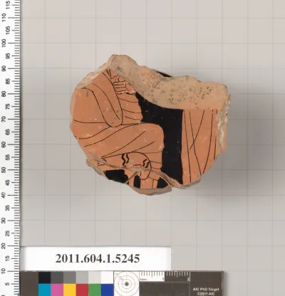 Terracotta fragment of a kylix (drinking cup)