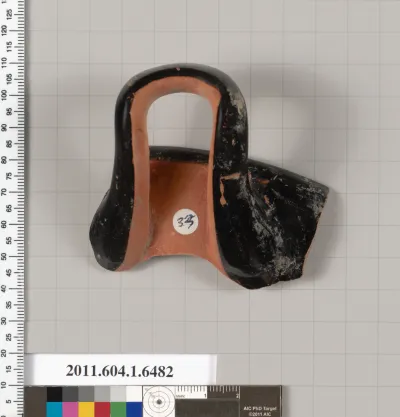 Terracotta fragment of a kylix (drinking cup)