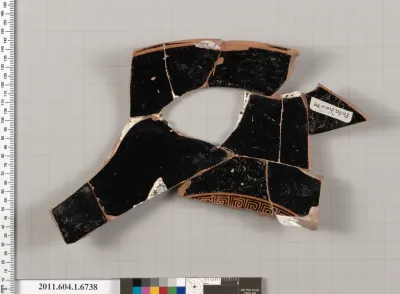 Terracotta fragment of a kylix (drinking cup)