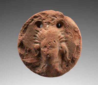 Loom weight with Gorgon head