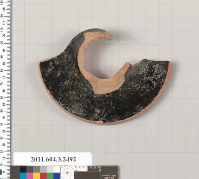 Terracotta fragment of a kylix (drinking cup)