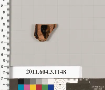 Terracotta fragment of a mastoid (drinking cup with narrow base) or a kyathos (cup-shaped ladle)