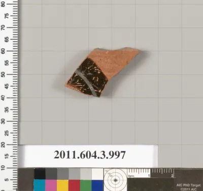 Terracotta fragment of a lekanis lid (covered dish)