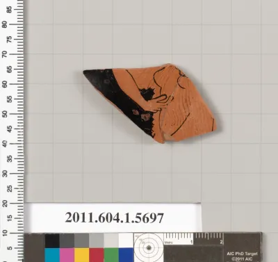Terracotta fragment of a kylix (drinking cup)