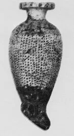 FIGURE VASE (CORINTHIAN, BLACK-FIGURE)