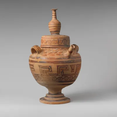 Terracotta spouted jar with lid